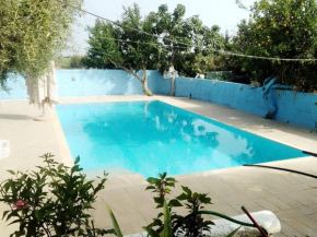 Casa nell'agrumeto con piscina